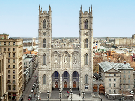 Notre-Dame Basilica of Montreal with Place d'Armes in the foreground and some Montreal buildings