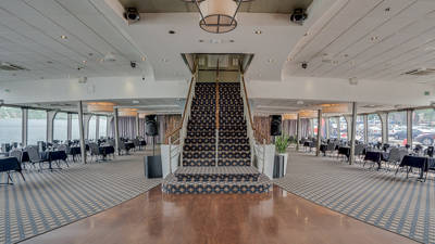 Main staircase with a view of the main hall of the AML Louis Jolliet ship in Quebec City